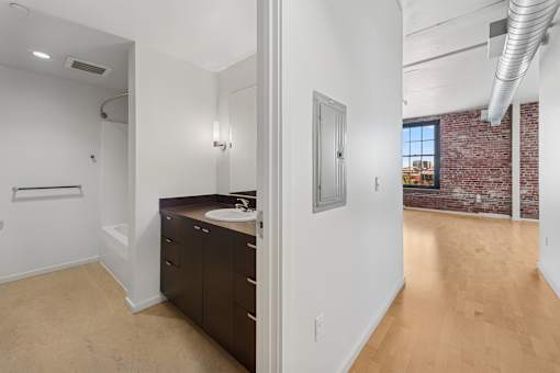 A bathroom with a sink and a toilet.