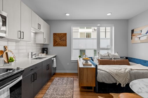 Gridline Apartments Studio kitchen and bedroom