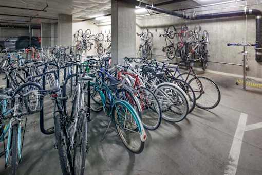 A parking garage full of bicycles.