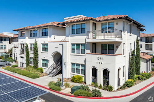 A white building with the number 1055 on it.