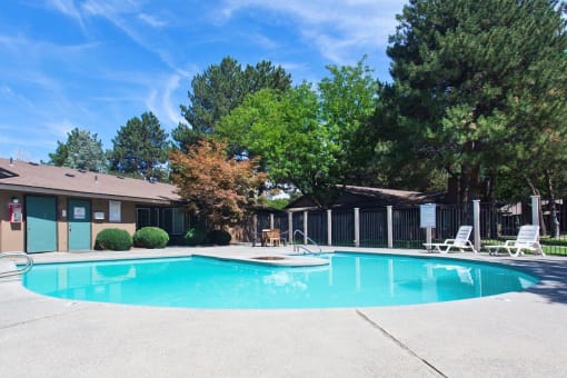 Arbropointe Apartments Pool with Lounge Chairs