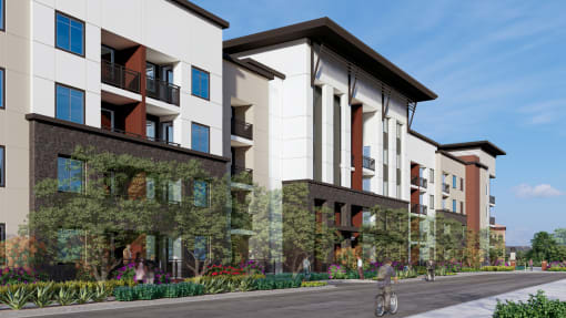 a rendering of an apartment building with a person riding a bike