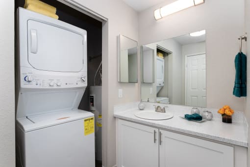 Bayview Apartment Homes Bathroom Vanity and Laundry Closet