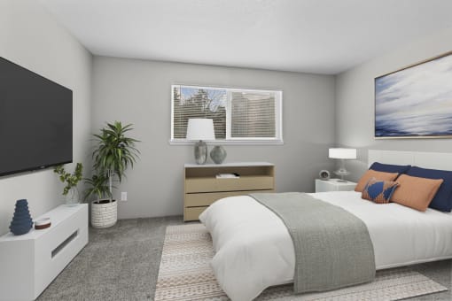 an image of a bedroom with a bed and a tv