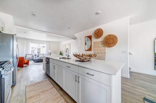 BLVD 120 Townhomes in Pleasant Grove, Utah Model Kitchen with Large Island