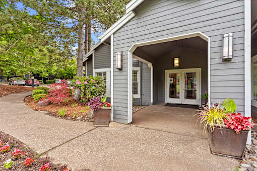 Exterior view of leasing office at Cedar Crest Apartments in West Beaverton, Oregon.