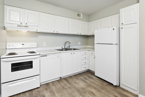 SITE Scottsdale Apartments Classic Kitchen with White Cabinets and Appliances