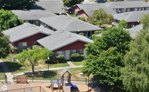 an aerial view of a neighborhood with a playground