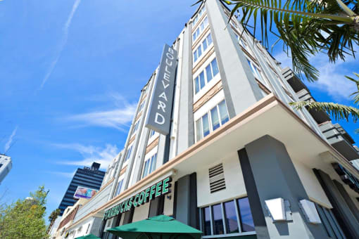 Boulevard on Wilshire Exterior Building View with Starbucks Coffee Shop
