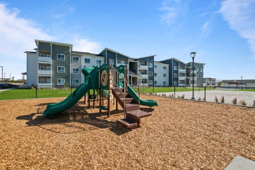 the preserve at ballantyne commons playground with slides and buildings