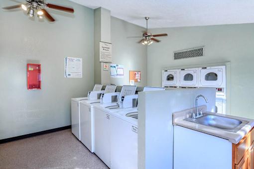 A laundry room with a washer and dryer.