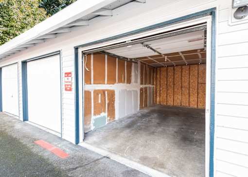 Spacious interior of garage at Heron Hills apartments in Gresham Oregon.