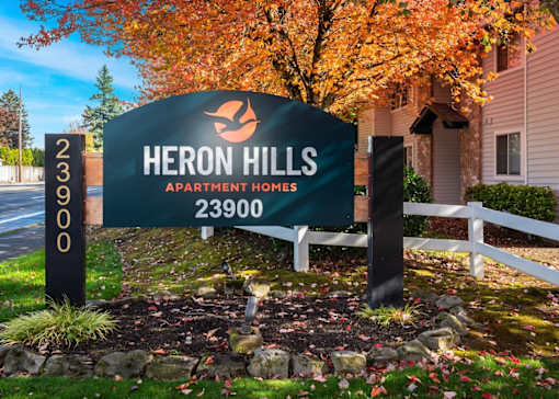 Front entryway signage at  Heron Hills apartments in Gresham Oregon.