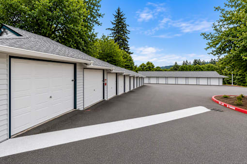 A long row of garage doors are closed.