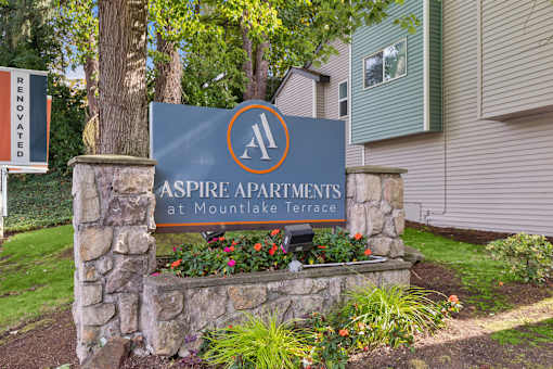 A sign for Aspire Apartments at Mountlake Terrace is shown.