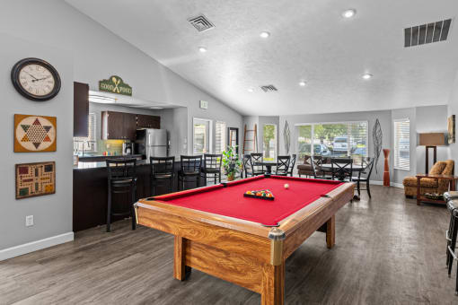 play a game of pool in our clubhouse at our apartments
