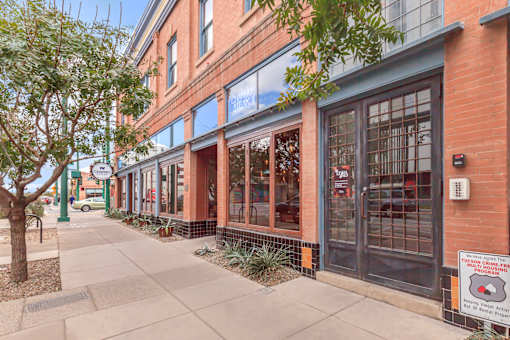 A building with a sign that says "Tucson Chili Cooking" on it.