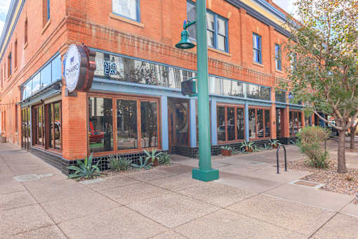 A red building with a sign that says "Charles".