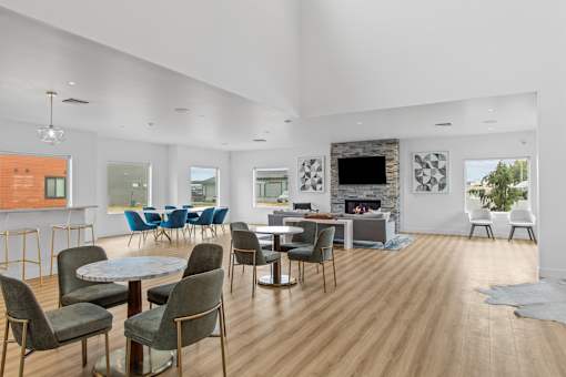 a living room filled with furniture and a fire place