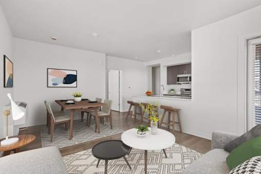 A modern living room with a dining table and chairs.