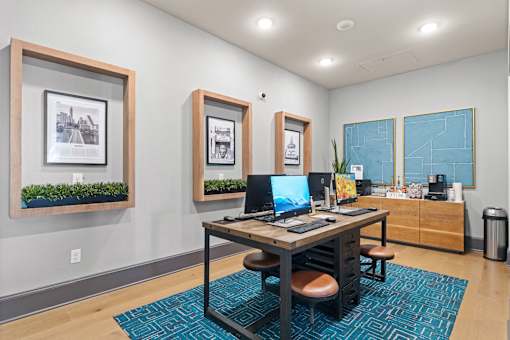 A room with a desk and a computer on it.