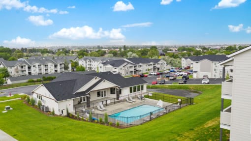 Pioneer Meadows Clubhouse with Pool and View of Property