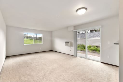 Pioneer Meadows Living Room with Private Patio