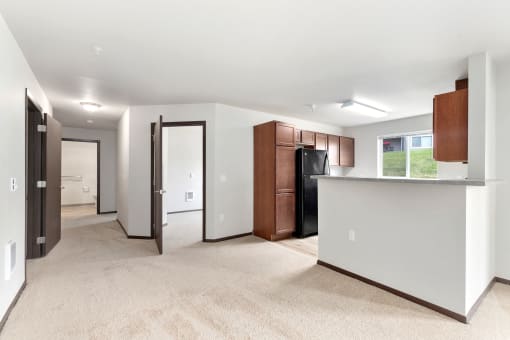 Pioneer Meadows Kitchen and View into Bedroom