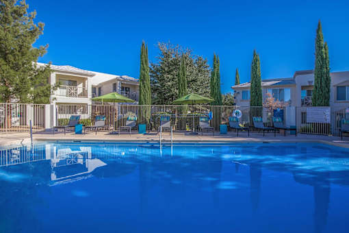 Port Royale Luxury Apartment Homes in Sierra Vista, Arizona Pool with Lounge Chairs