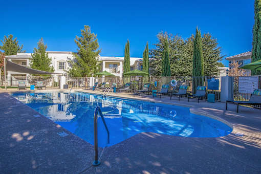 Port Royale Luxury Apartment Homes in Sierra Vista, Arizona Pool with Lounge Chairs