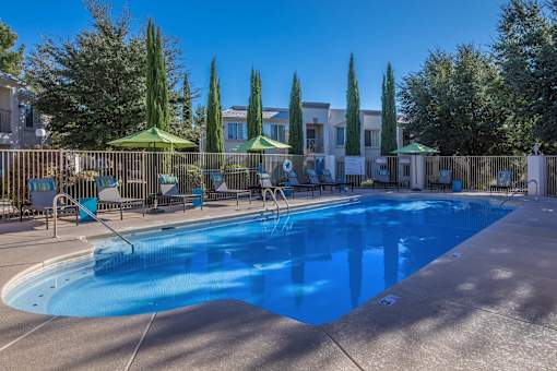Port Royale Luxury Apartment Homes in Sierra Vista, Arizona Pool with Lounge Chairs