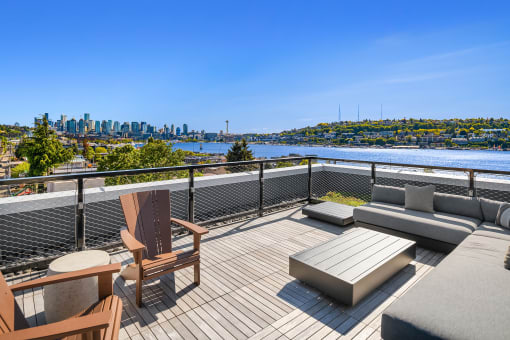 a balcony with a view of a city and a river at Liza Apartments, Washington