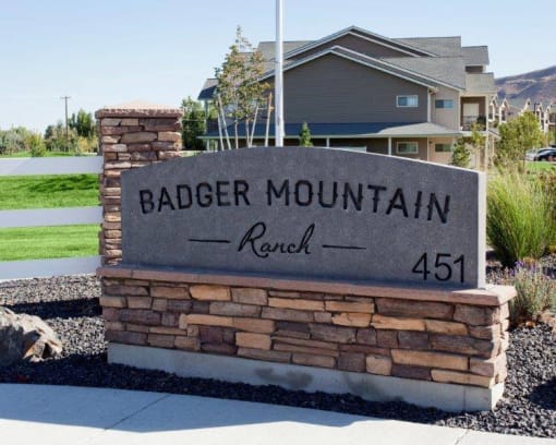 Badger Mountain Ranch monument sign in front of leasing office