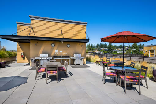 Lux Apartments Rooftop Patio with Grills