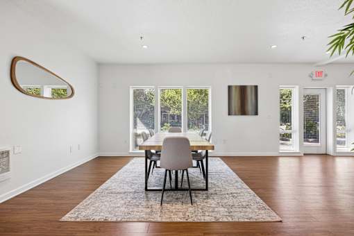 Community clubhouse long table with seating at Springwater Crossing apartments in Gresham, Oregon 97030