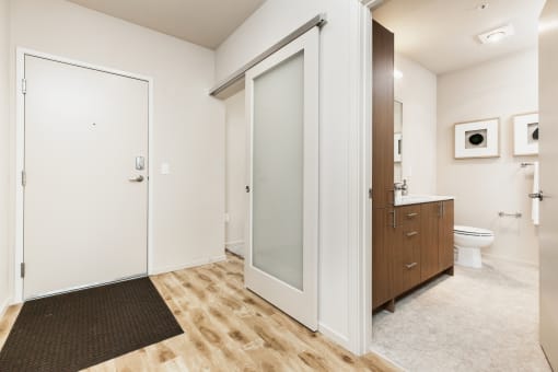 a bathroom with a shower and a sink and a toilet at The Hayes on Stone Way, Washington, 98103