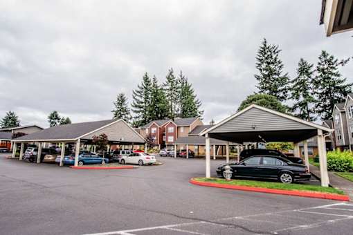 The Lucent Apartments in Tacoma, Washington Exterior and Parking Lot with Covered Parking