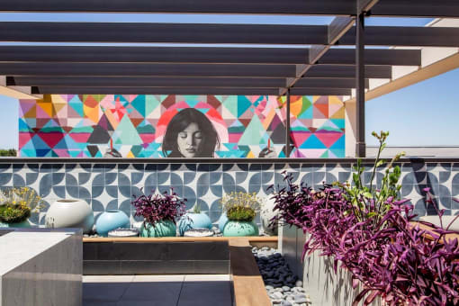 Trovita Rio Apartments in Tempe, Arizona Patio and Wall Mural
