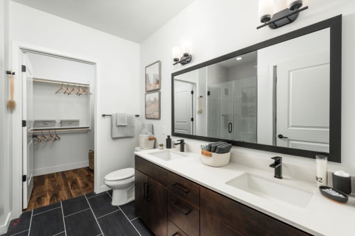 Trovita Rio Apartments in Tempe, Arizona Model Bathroom with Attached Walk-In Closet