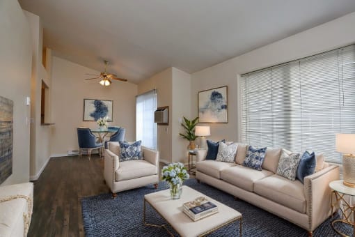 a living room with two couches and a coffee table