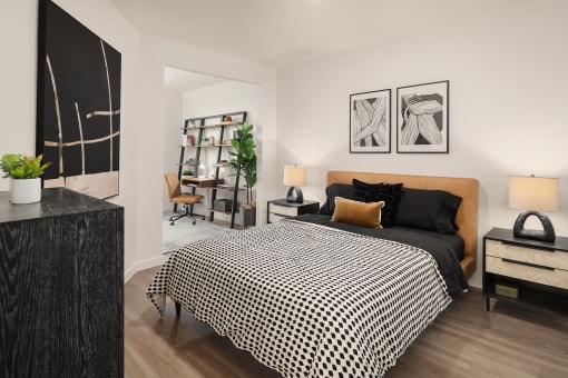 a bedroom with a large bed in a 555 waverly unit at The Hemlock, Seattle, 98103