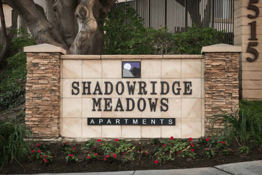 a sign in front of a building
