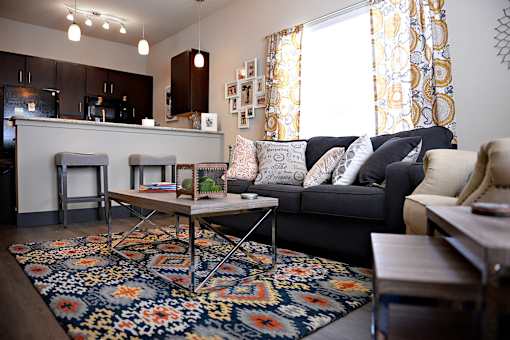 Expansive Living Room with wide windows at H Squared Apartments, Denton, TX, 76201