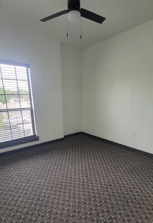 Carpeted room at The Talon, Denton, Texas