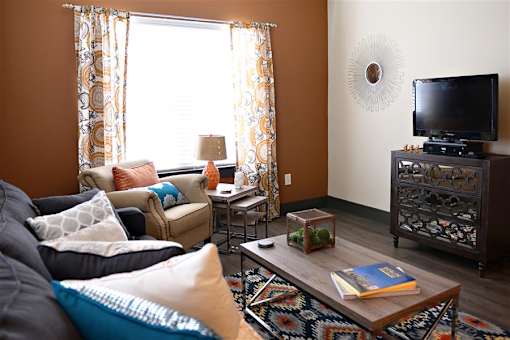 Modern Living Room with TV at H Squared Apartments, Denton, TX, 76201