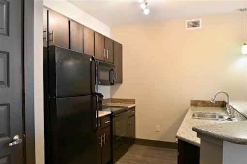 Amazing kitchens with modern appliances at H Squared Apartments, Denton, TX