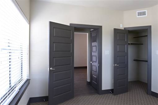 Generous Walk-In Closets With Shelving at H Squared Apartments, Texas