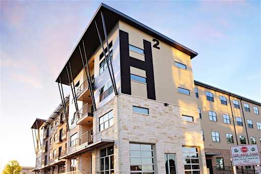 Property Exterior with apartment balcony at H Squared Apartments, Texas