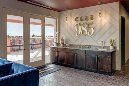 Resident lounge w/ coffee bar and vending machine at 985 High Apartments, Ohio, 43201