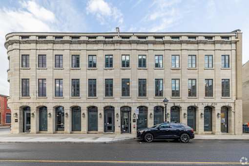 a large building with a car parked in front of it